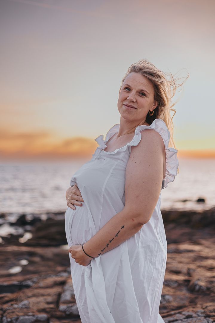 gravidfotografering vid havet