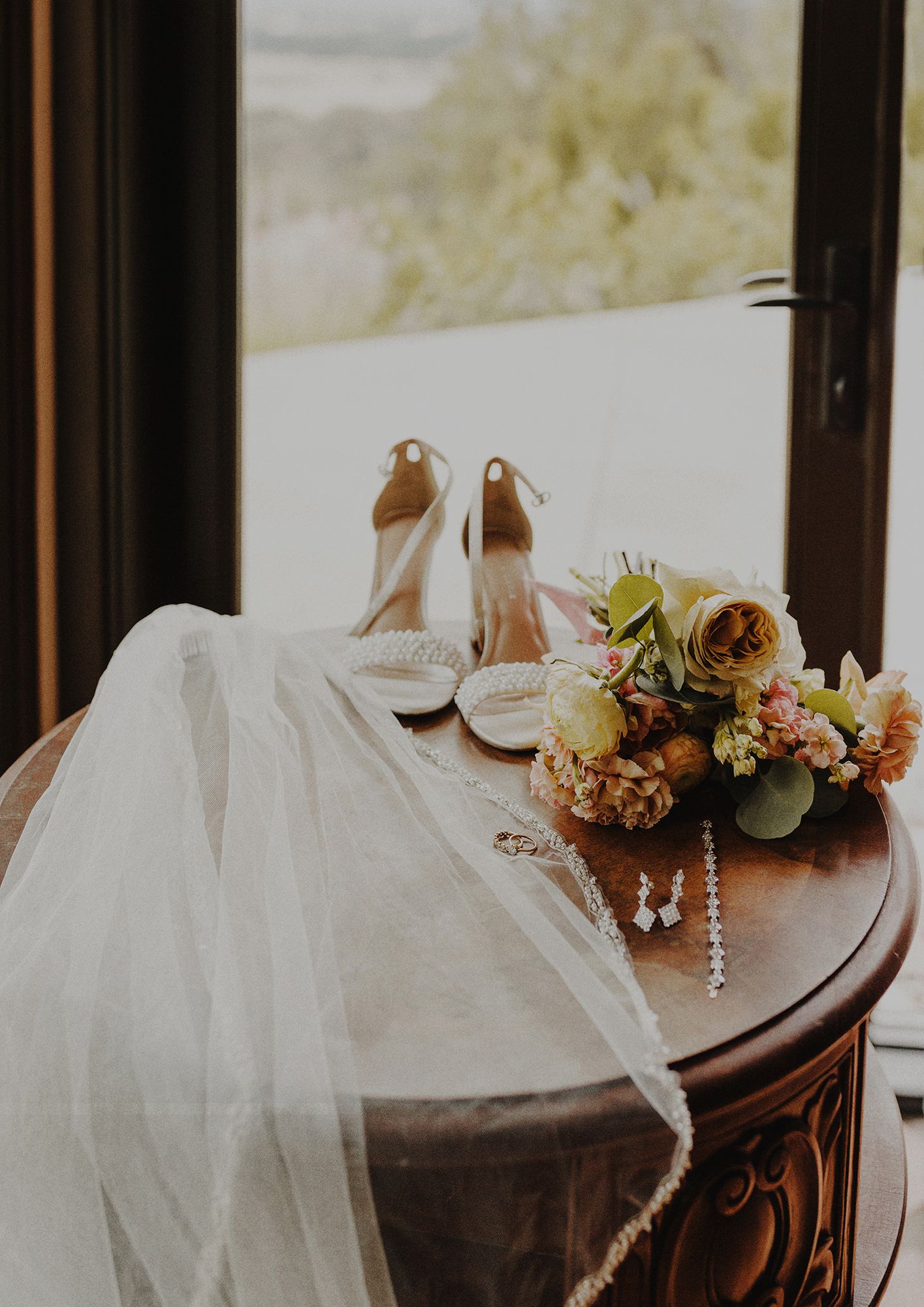 E Noelle Photography in-home wedding in Hidden Hills Los Angeles, bride ring, veil and jewelry detail shot