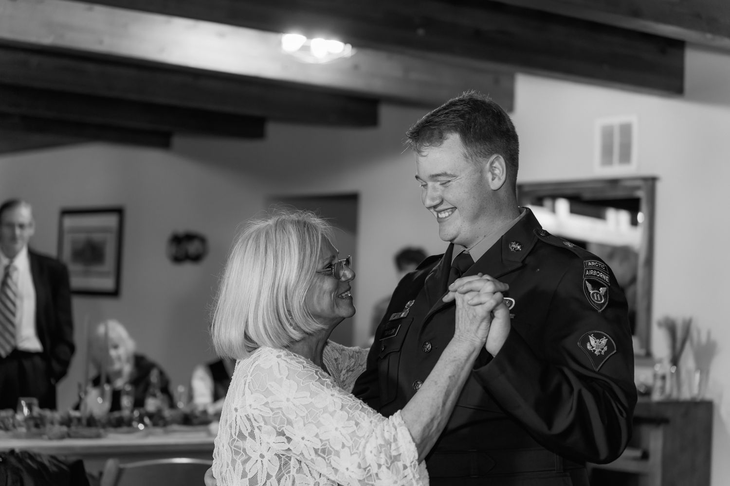 groom dances with his grandmother