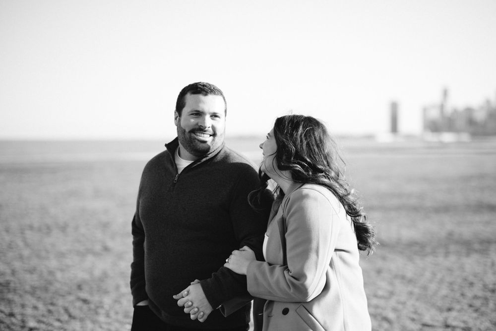 Captivating view of the city skyline as couple shares a tender moment
