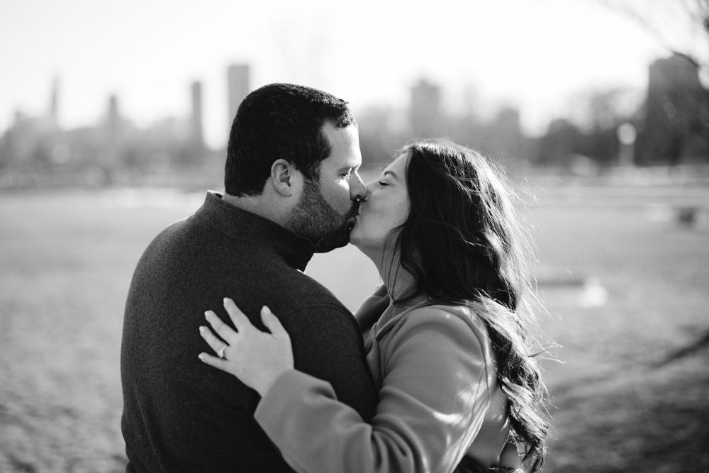 Loving embrace by the serene beauty of Fullerton Lake captured in engagement session
