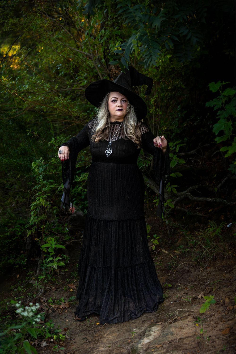 A beautiful witch in the woods.