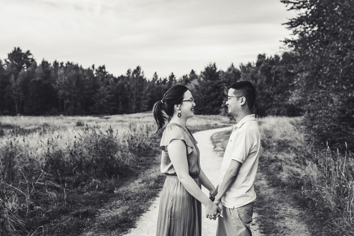 Black and white photo of husband and wife looking at each other in Surrey BC