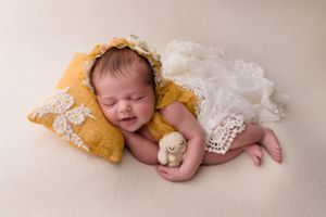 newborn baby side pose in bonnet West Midlands
