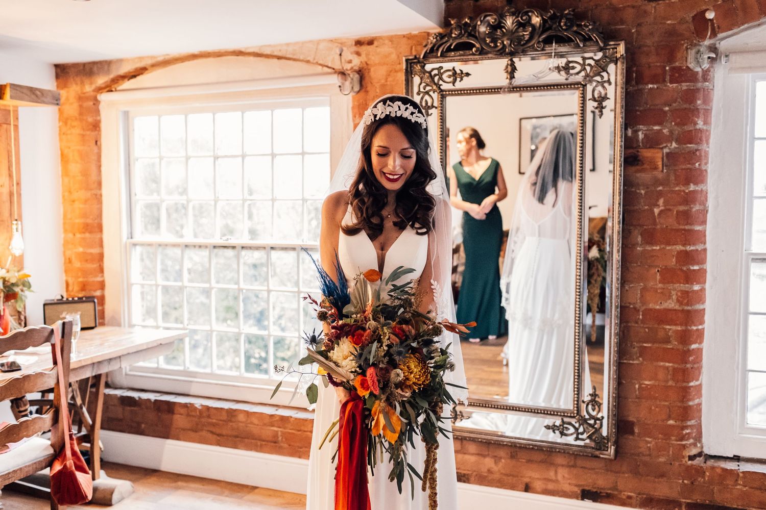 bride looking down at flowers