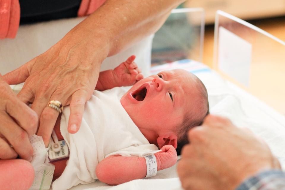 Baby Girl Yawning - Newborn Photo Session - Hospital