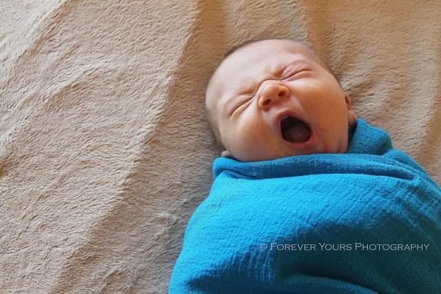 Baby Boy Yawning - Newborn Photo Session - At Home