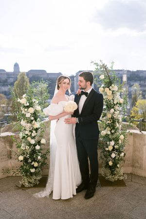 romantic-wedding-ceremony-setup-with-floral-arch-and-seating-in-budapest-outdoor-destination-venue.jpg