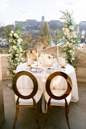 budapest-wedding-terrace-decor-with-city-panorama-elegant-table-styling-and-romantic-sunset-reception.jpg