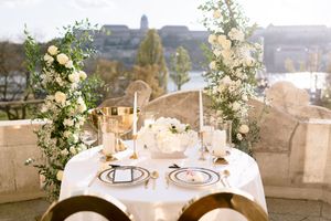 romantic-wedding-decor-on-terrace-in-budapest-with-view-of-parliament-and-danube-cityscape.jpg