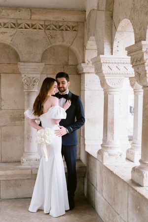 bride-and-groom-in-budapest-romantic-wedding-photo-with-city-view-destination-couple-at-iconic-location.jpg