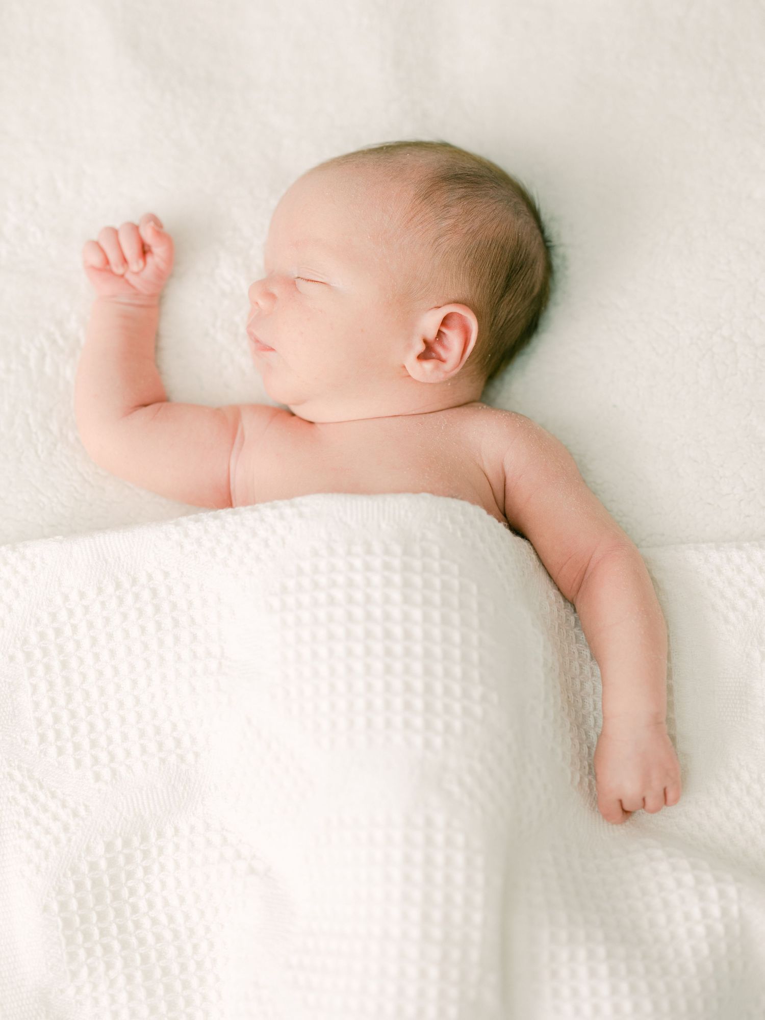 asleep newborn in-home Salt Lake City utah on bed at home baby Michelle Deppe Photography