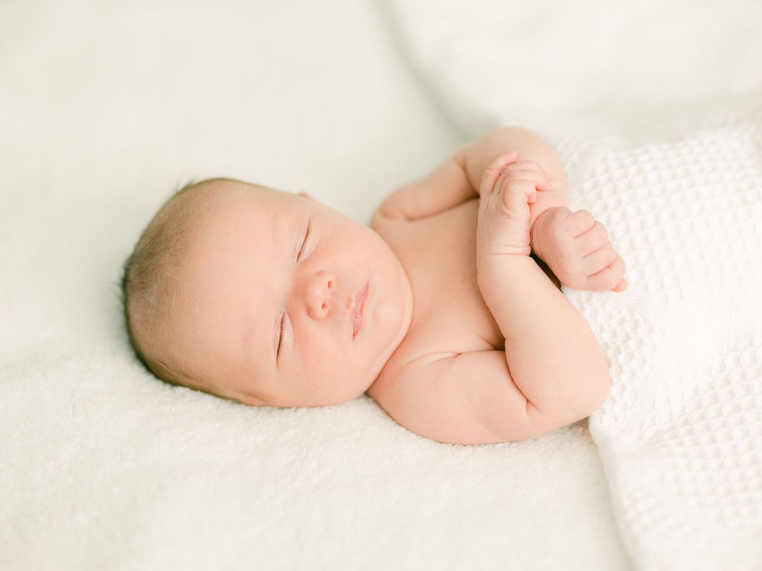 newborn in-home Salt Lake City utah on bed at home baby Michelle Deppe Photography