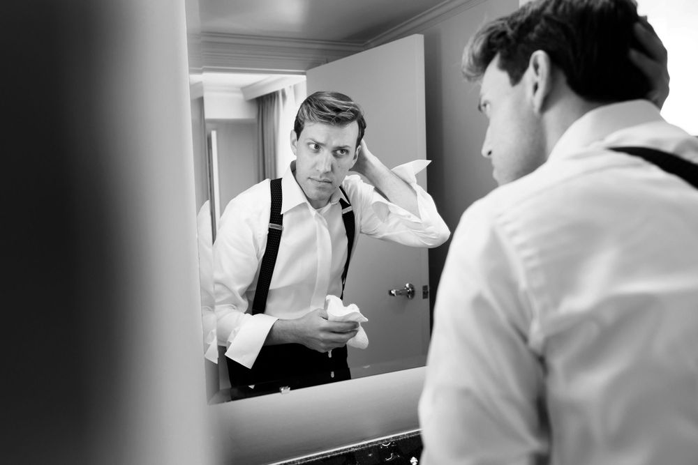 Groom getting ready for wedding at InterContinental Cleveland photographed by Tom Forrest.