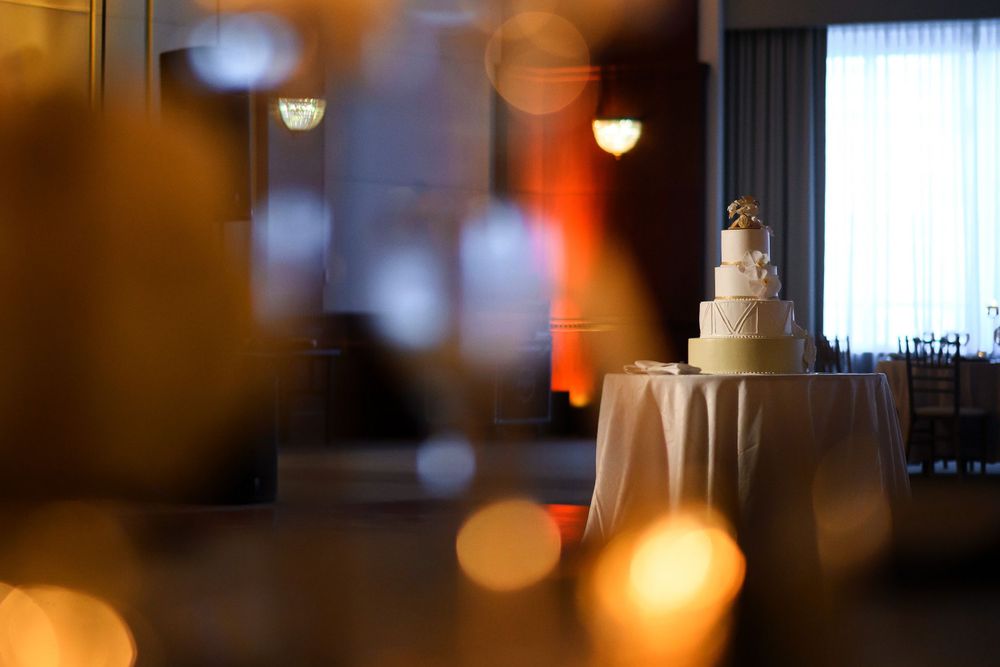 Creative photo of cake during wedding reception at InterContinental Cleveland photographed by Tom Forrest.