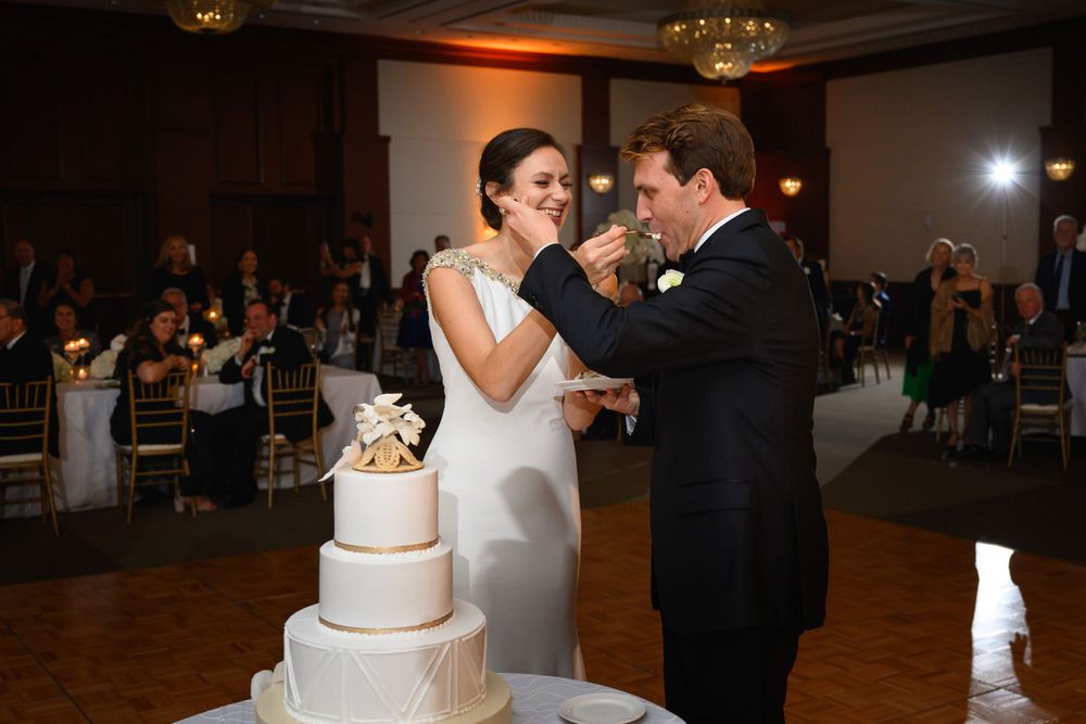Cake cutting during wedding reception at InterContinental Cleveland photographed by Tom Forrest.