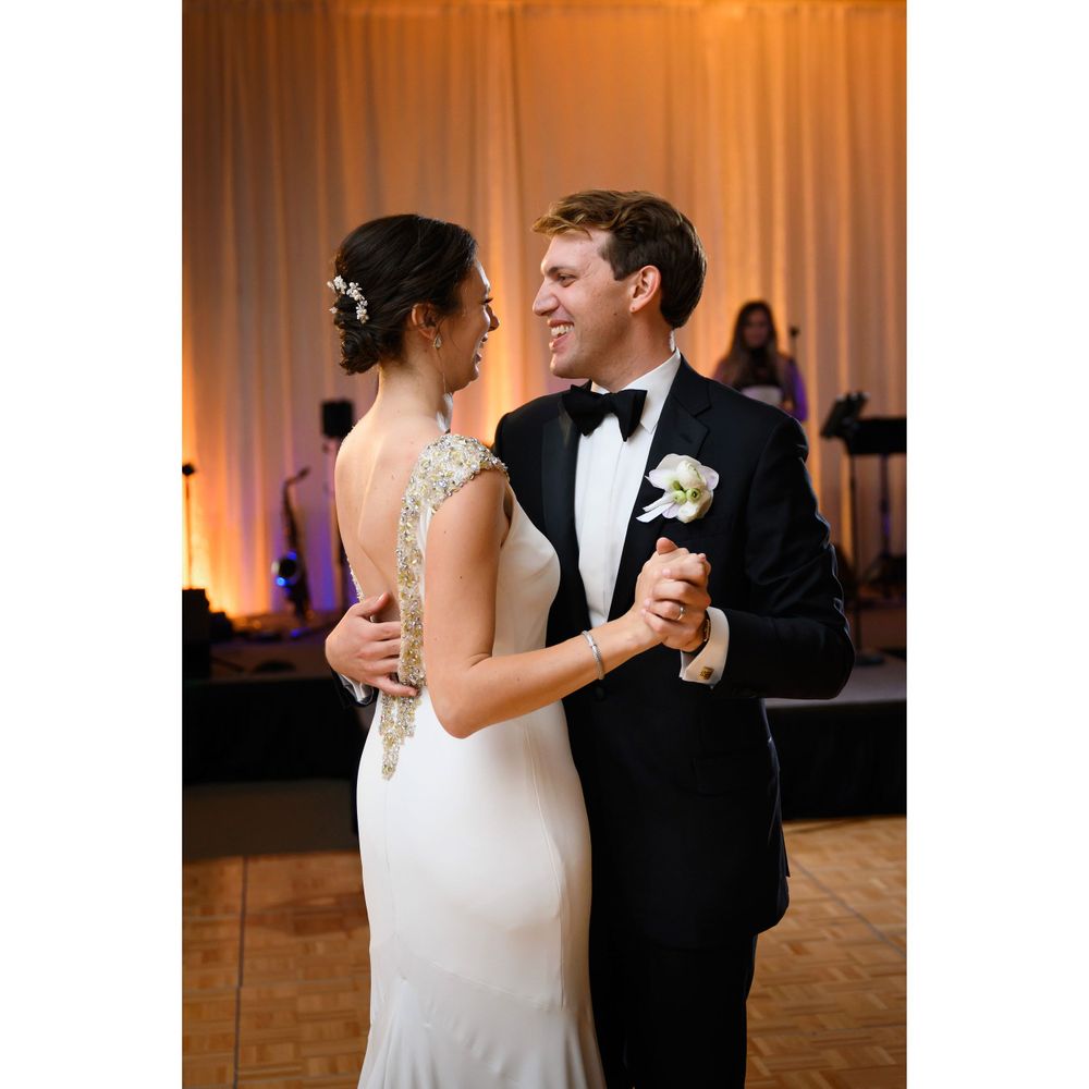 Bride and groom dance during wedding reception at InterContinental Cleveland photographed by Tom Forrest.
