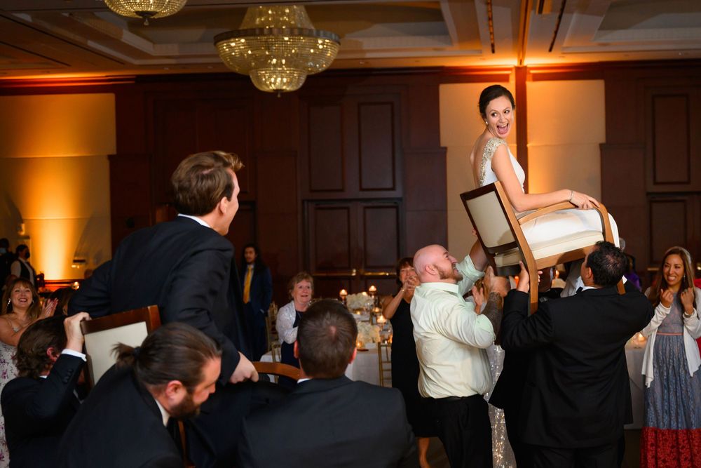 Fun hooray during wedding reception at InterContinental Cleveland photographed by Tom Forrest.