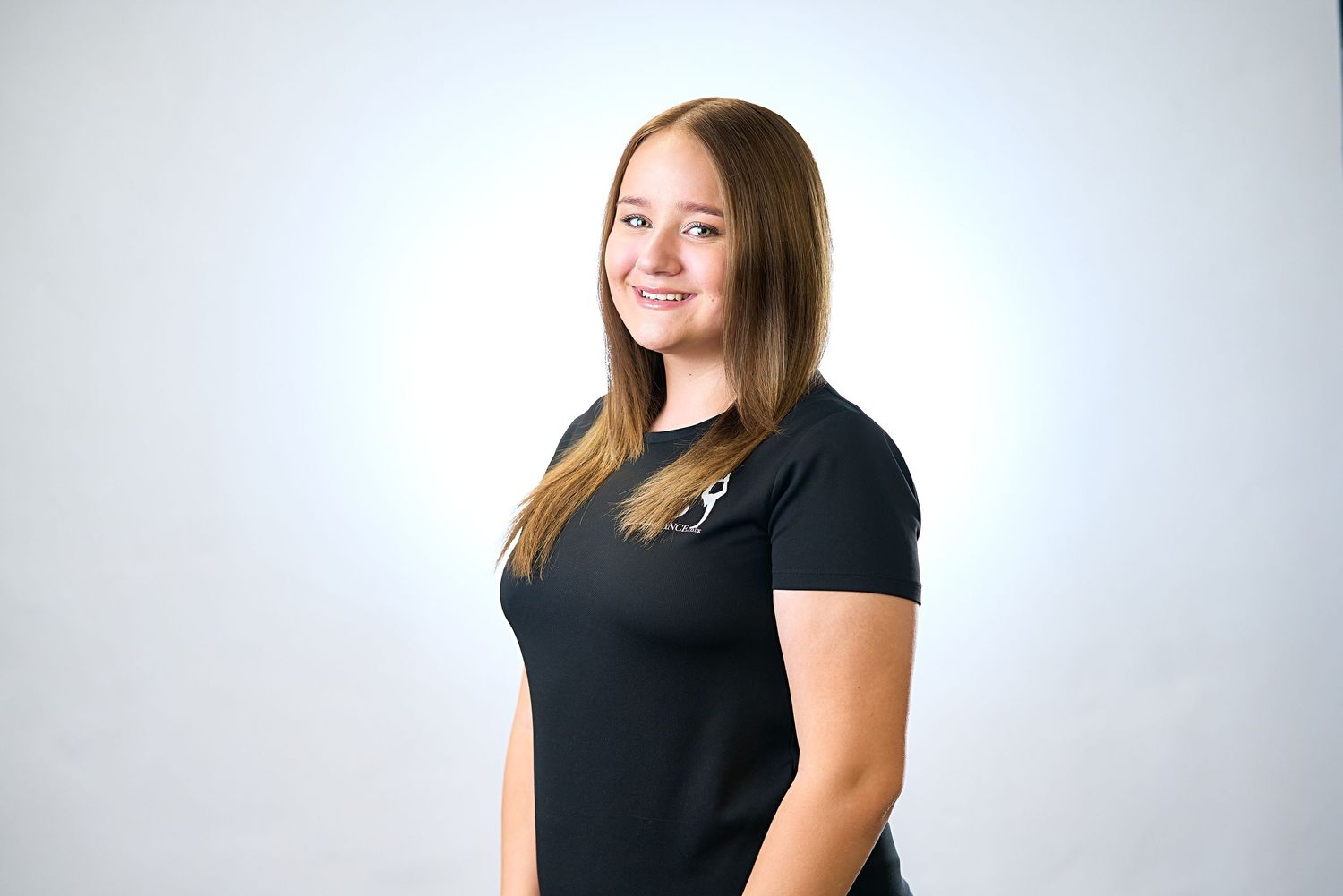 Corporate Headshot Professional Business Portrait of a Dance teacher wearing black on a white background