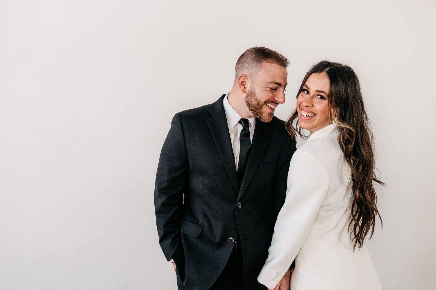 Engaged man and woman in Houston photography studio.