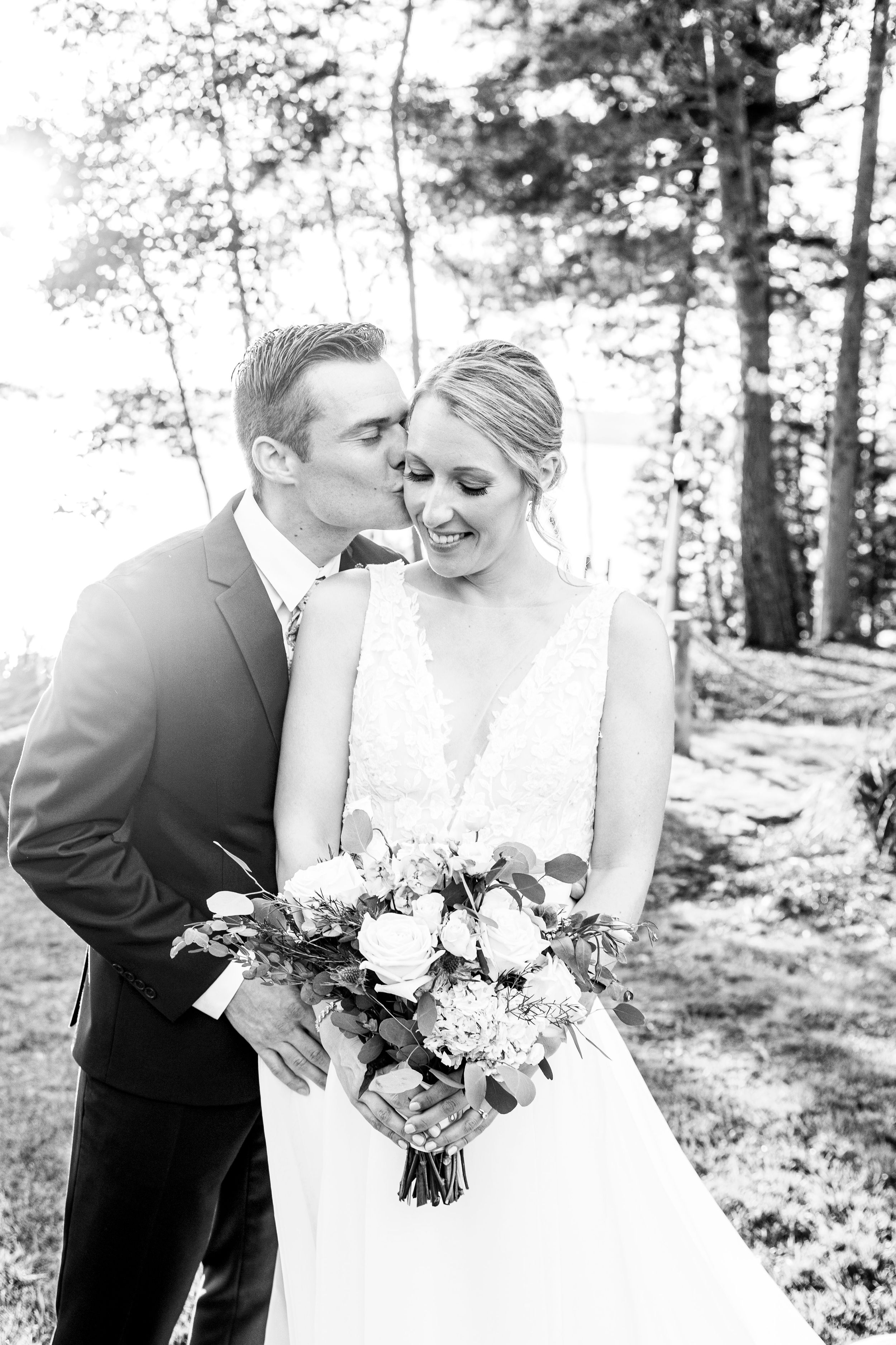 Wedding portrait at the lake in Rangeley, Maine.