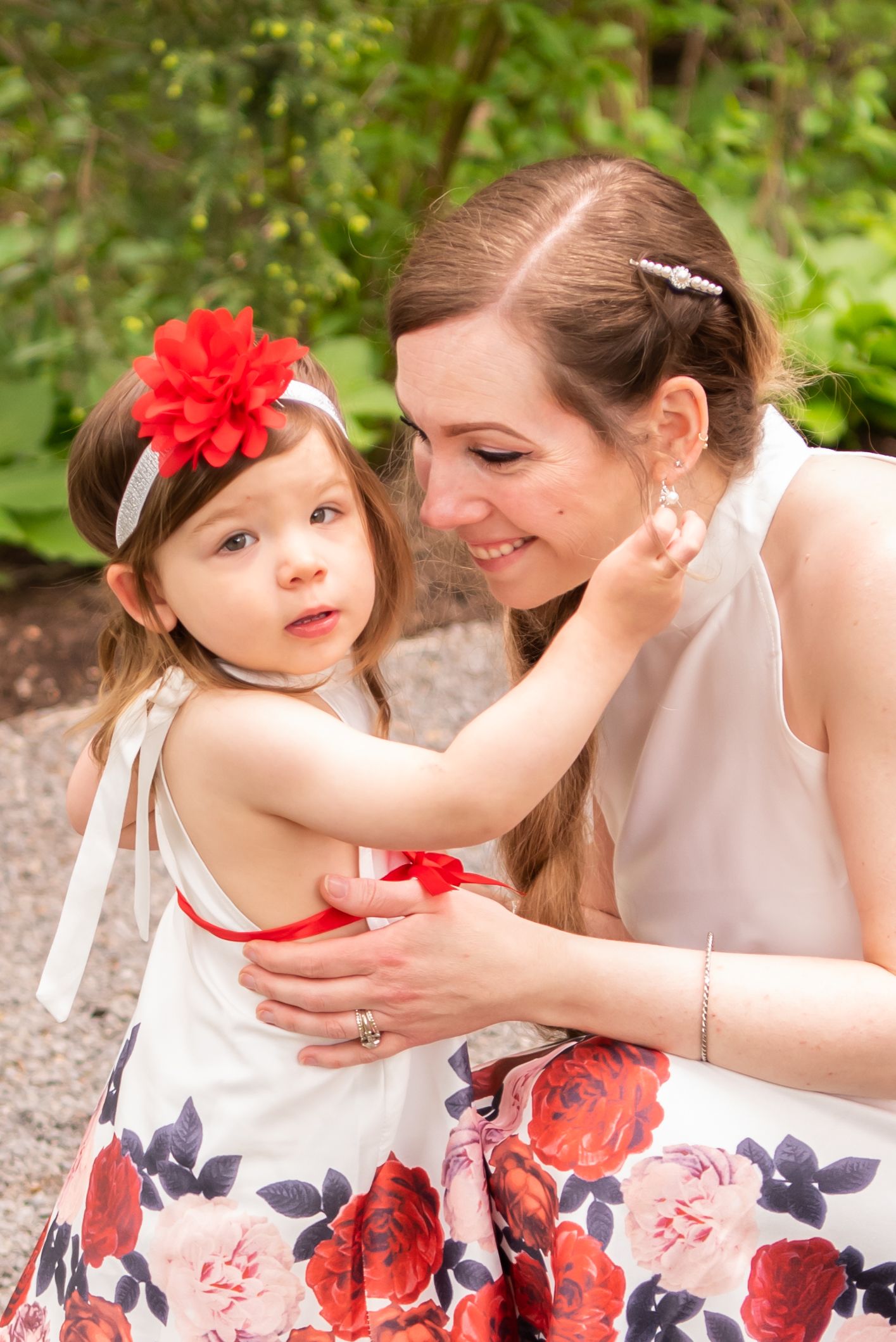 mom and daughter with matching flower dresses