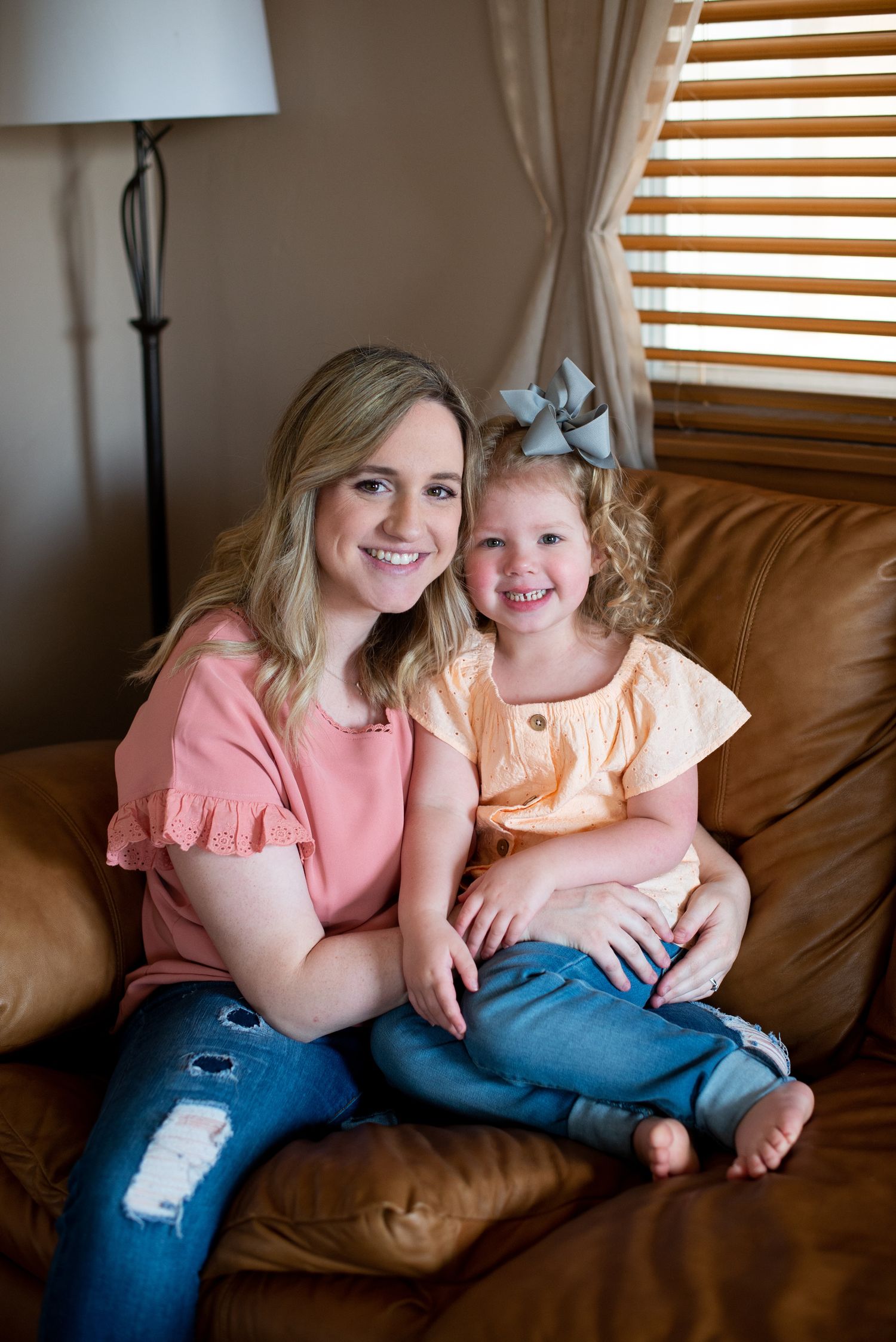 In-home lifestyle newborn family photo session by Wichita photographer