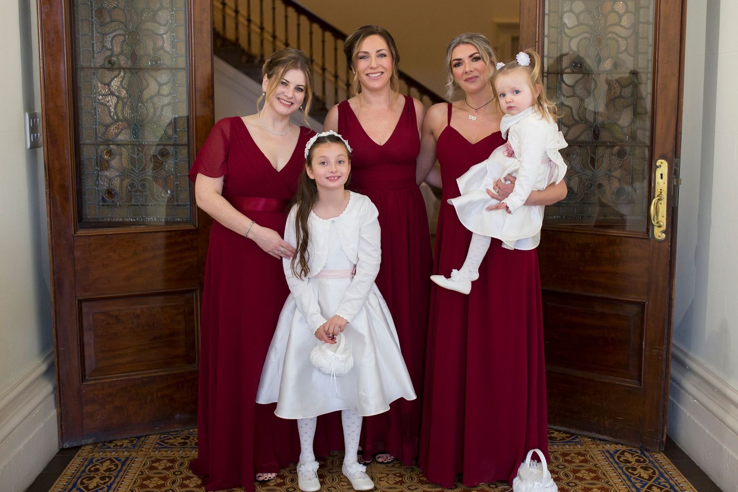 Bridesmaids gathered in Runcorn Town Hall entrance