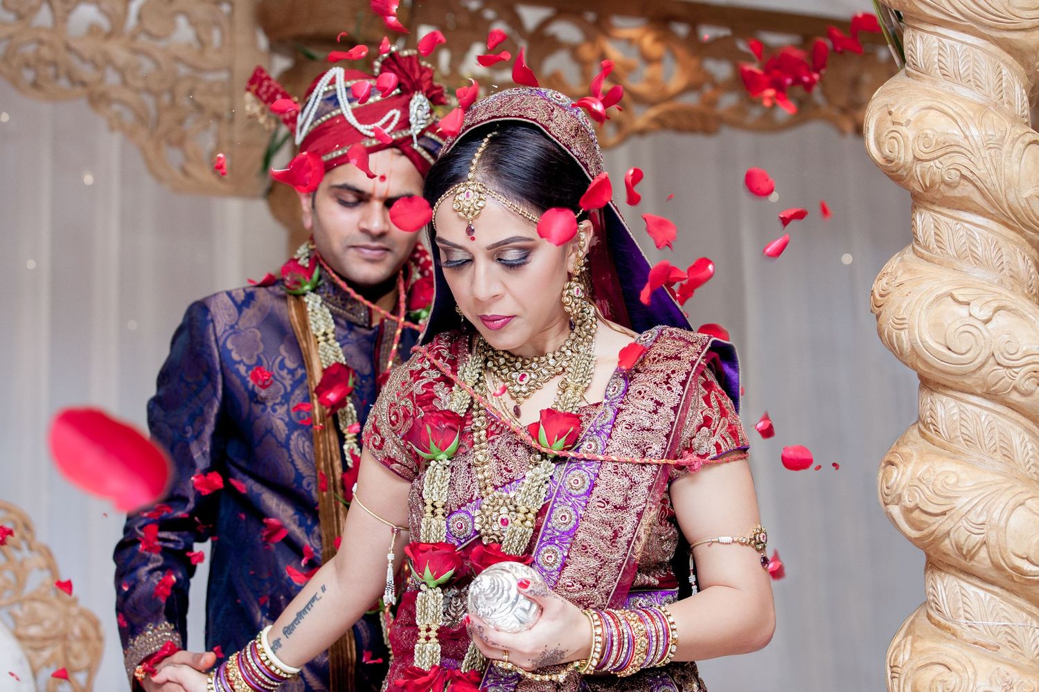 The gorgeous Komal as she leads Vinod around the fire at their wedding at the Swaminarayan Temple in Willesden