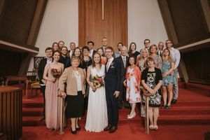 Groom and Bride with the whole family inside the church