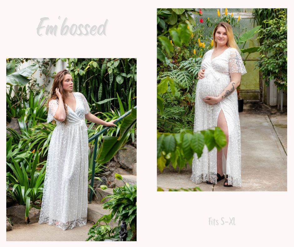 White lace maternity dress photographed in tropical garden setting.