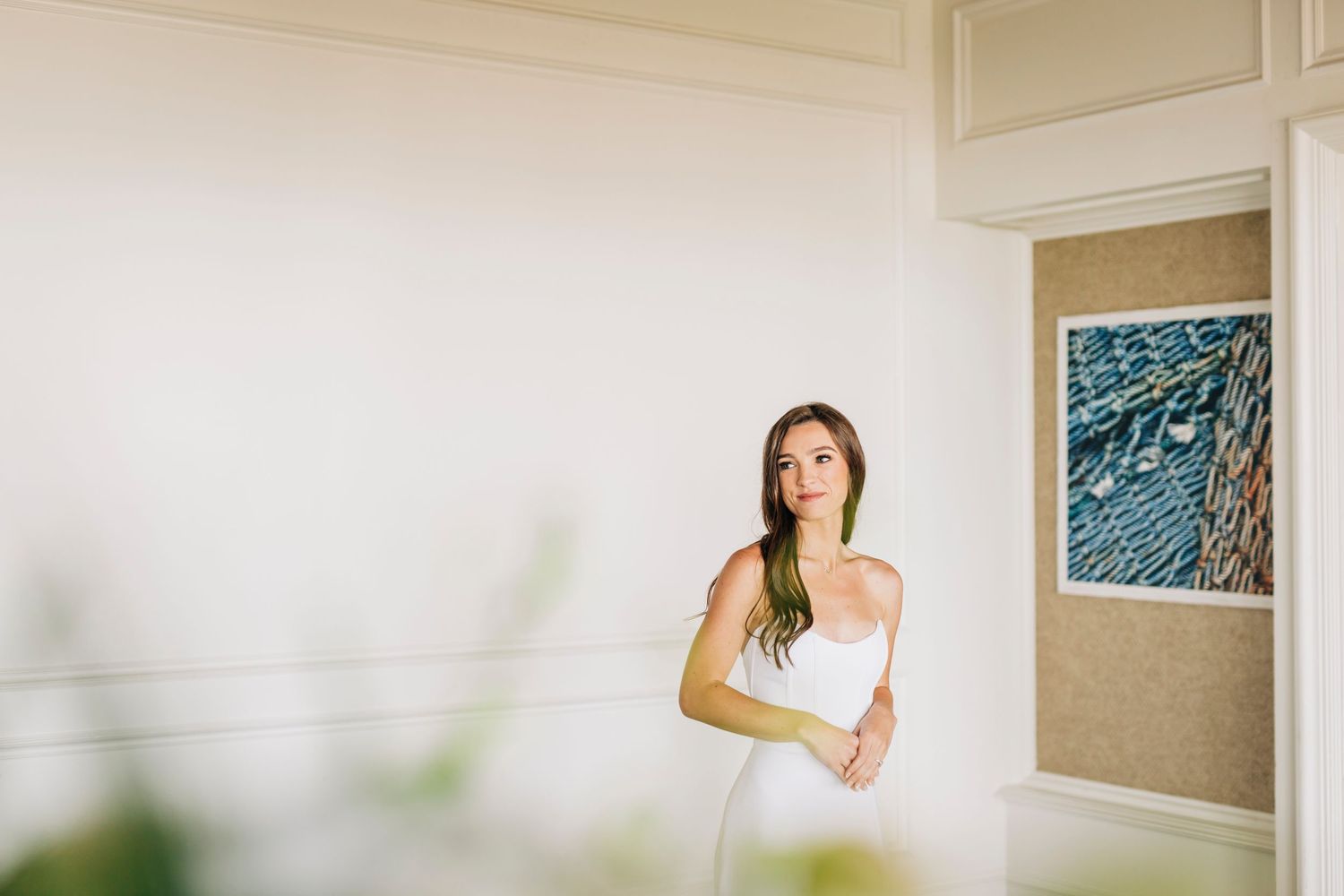 Bride posing for her bridal portraits at the Ritz Carlton Beach Club taken by Sarasota Wedding photographer.
