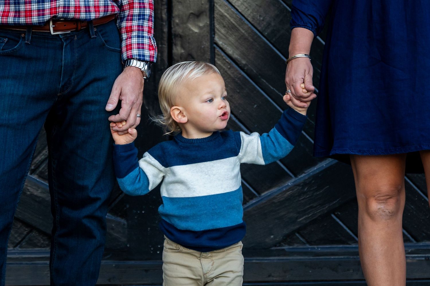 A sequence of tender family moments showing affectionate interactions outdoors.