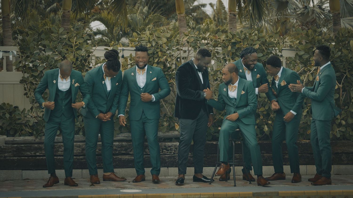 The groom and his groomsmen share a joyful moment filled with laughter, captured by Jyjys-Photography in west palm beach