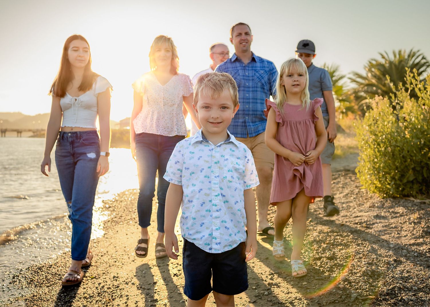 family walks along beach in san francisco family photography session