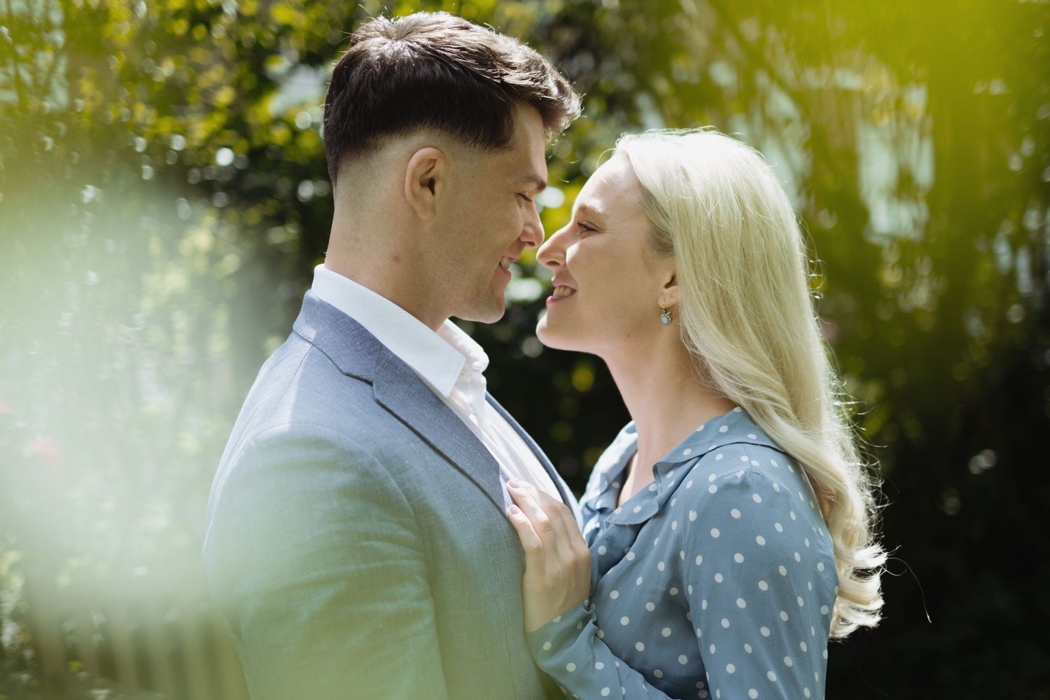 A pre wedding moment captured as the couple are about to kiss.