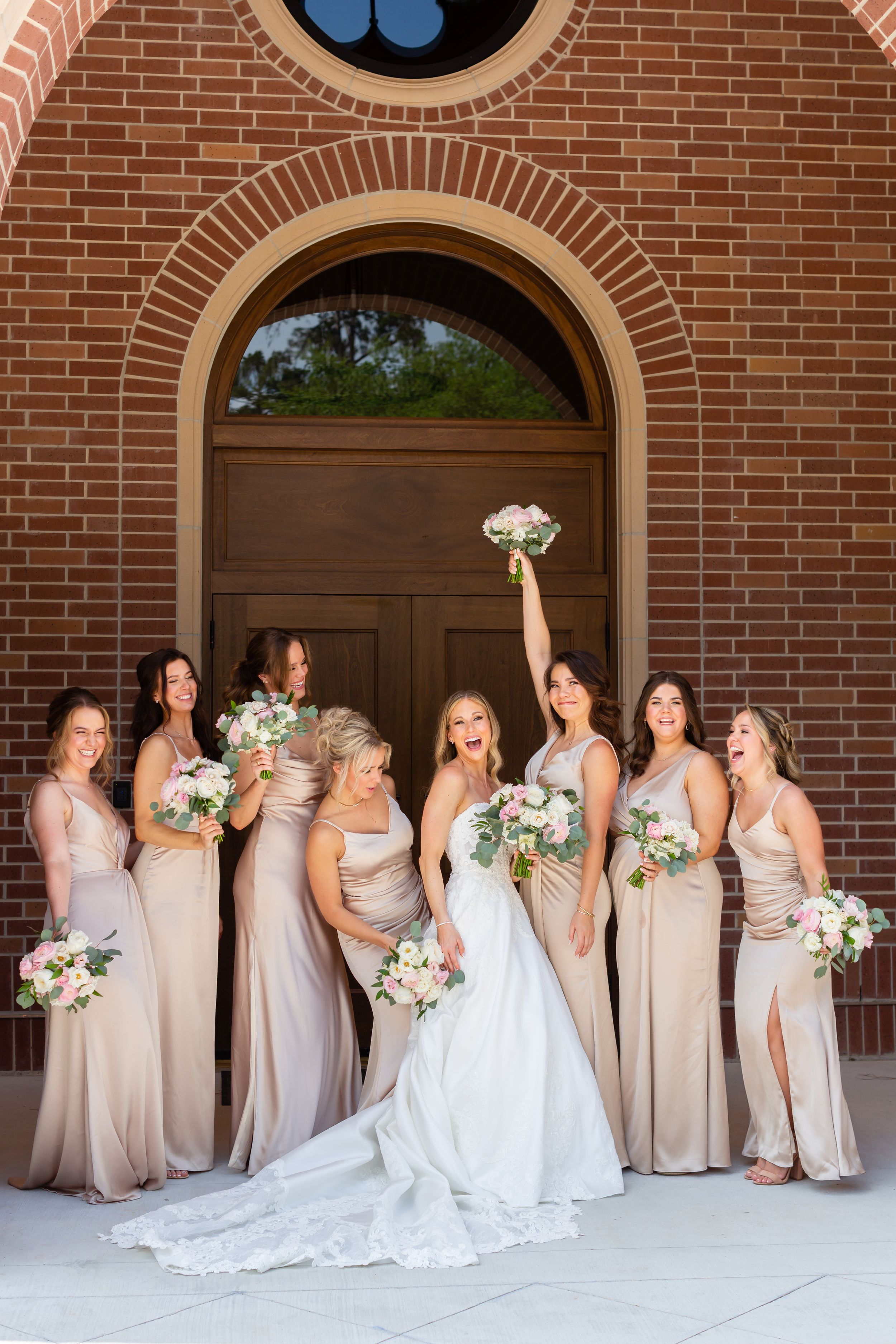 Bride and bridesmaids are excited for the wedding to begin in Houston, TX.