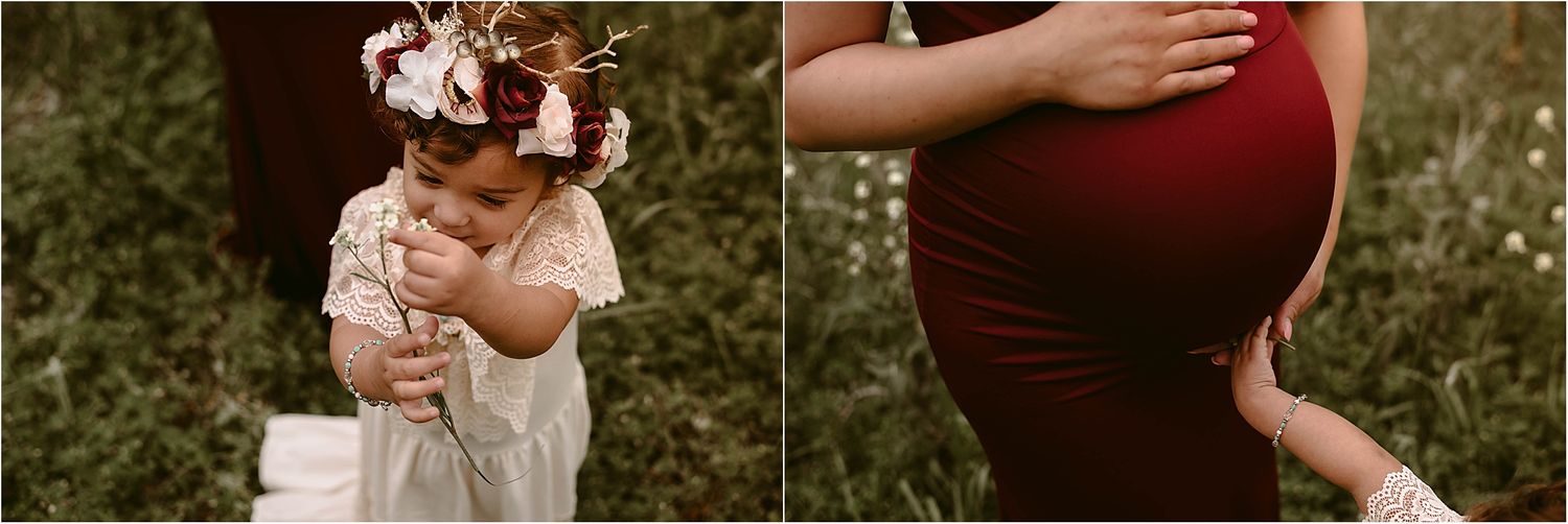Close-up details of a pregnancy photoshoot featuring a burgundy dress and delicate hand placement.