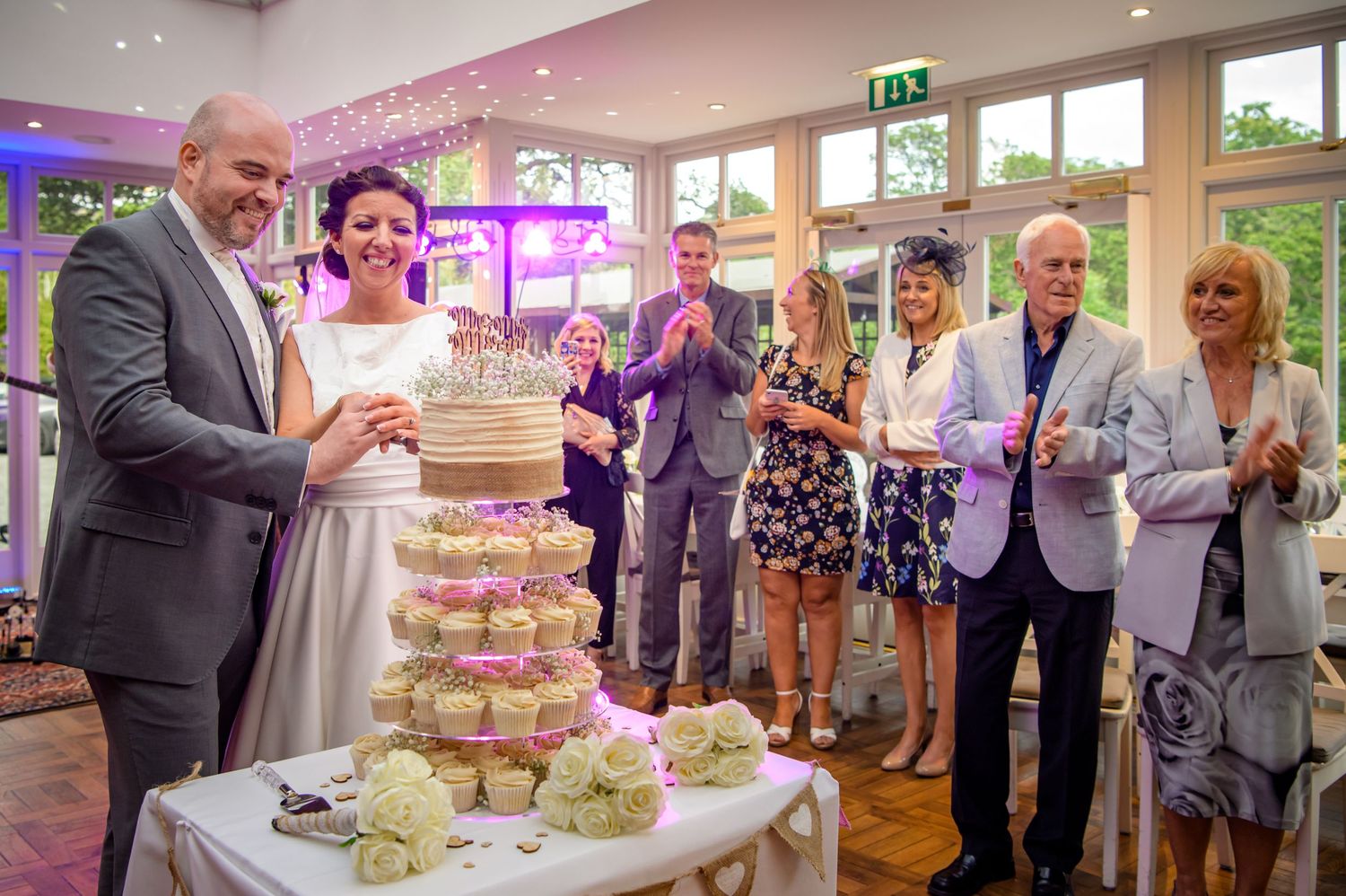Bride and groom cutting cake at Broadoaks Country House wedding