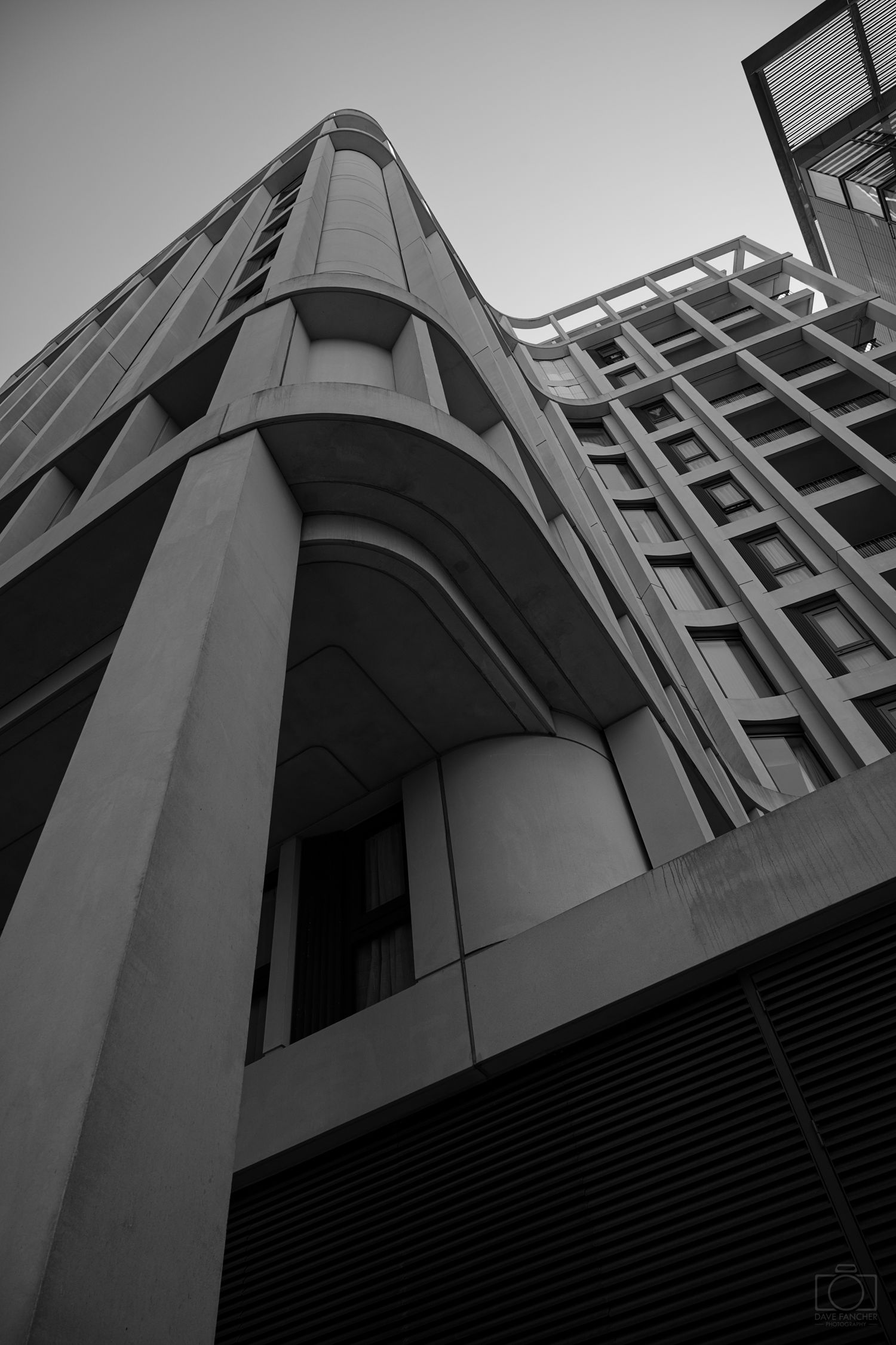 Black and white image of the Cleland House condominium complex