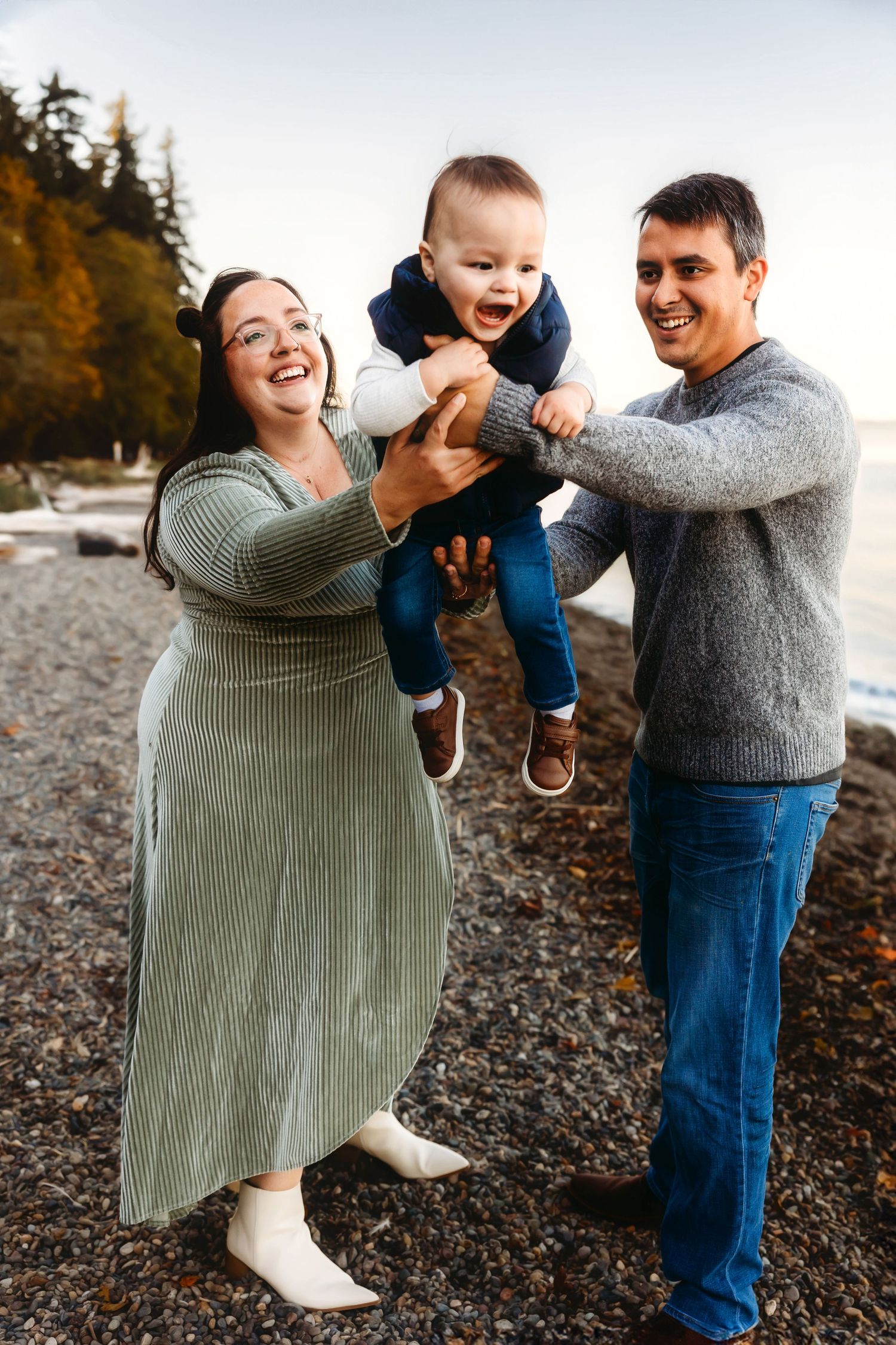 Swinging little boy for family photo session at Owens Beach in Tacoma