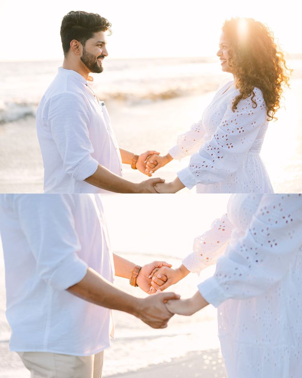 Couple holding hands and dancing together on beach in matching white outfits.