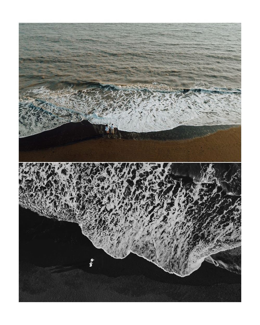 Dramatic black and white ocean waves crashing on shoreline.