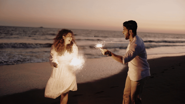wedding photographer in london capturing couple playing with firecrackers
