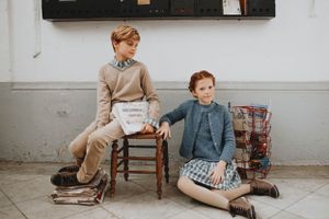 Vintage-style kids fashion photo for a brand in Casablanca, capturing playful and stylish moments with a nostalgic touch.