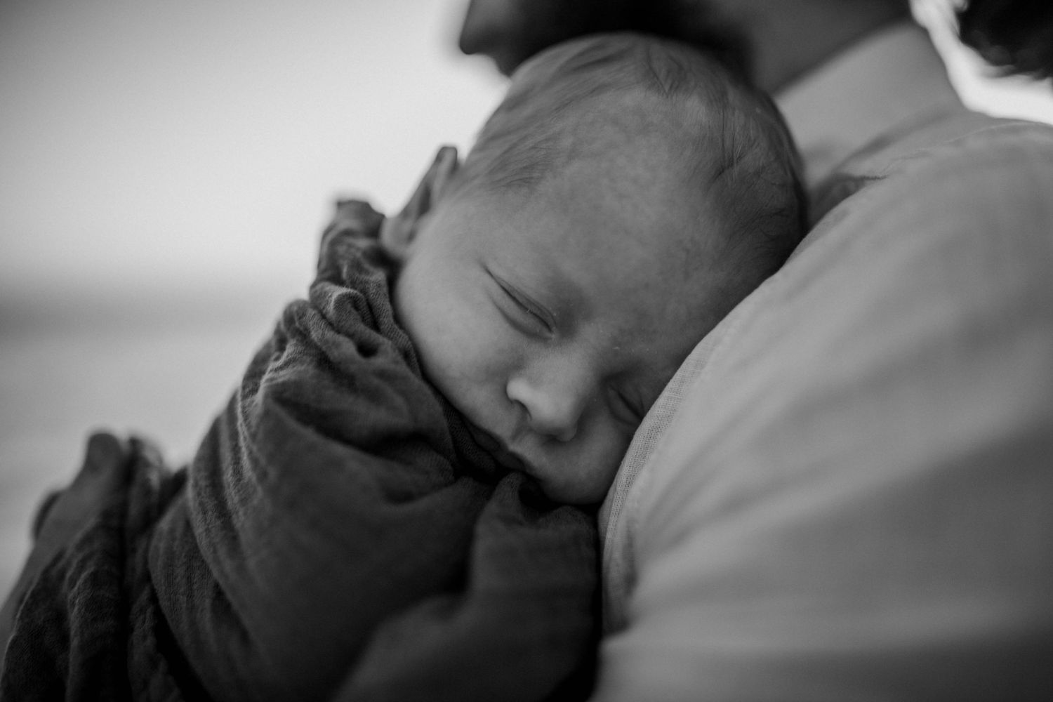 black and white picture of a newborn baby boy