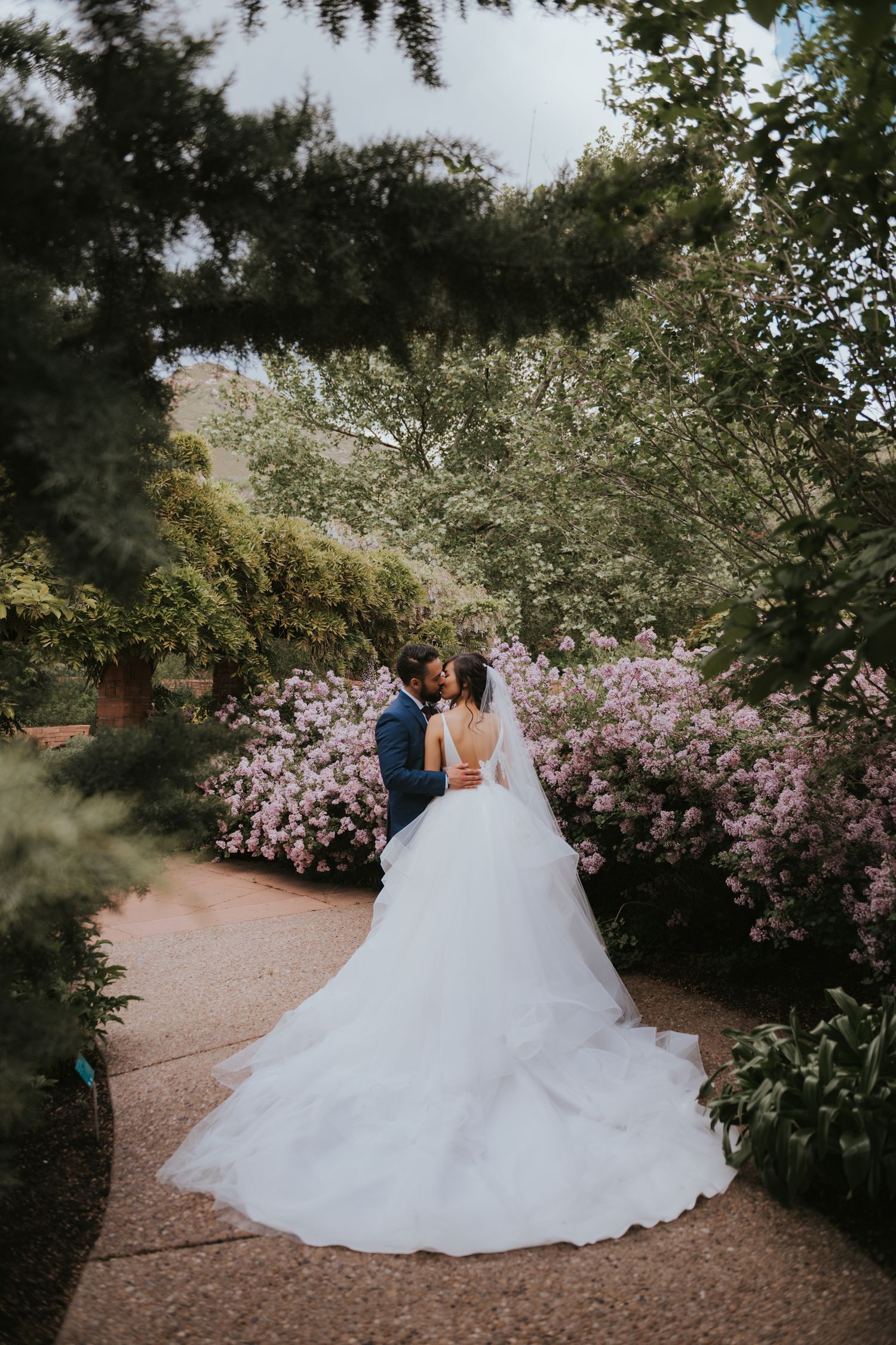 A stunning summer garden wedding at Red Butte Garden in Salt Lake City Utah. Captured by a talented local photographer