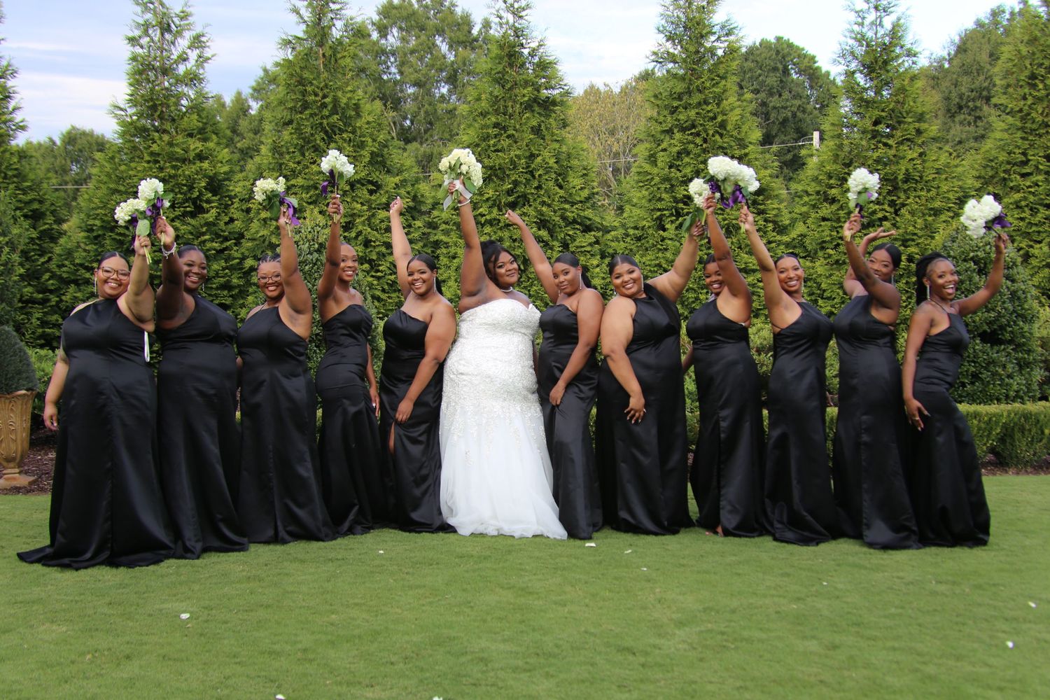 Wedding party celebration sequence showing group tossing items into the air on green lawn.