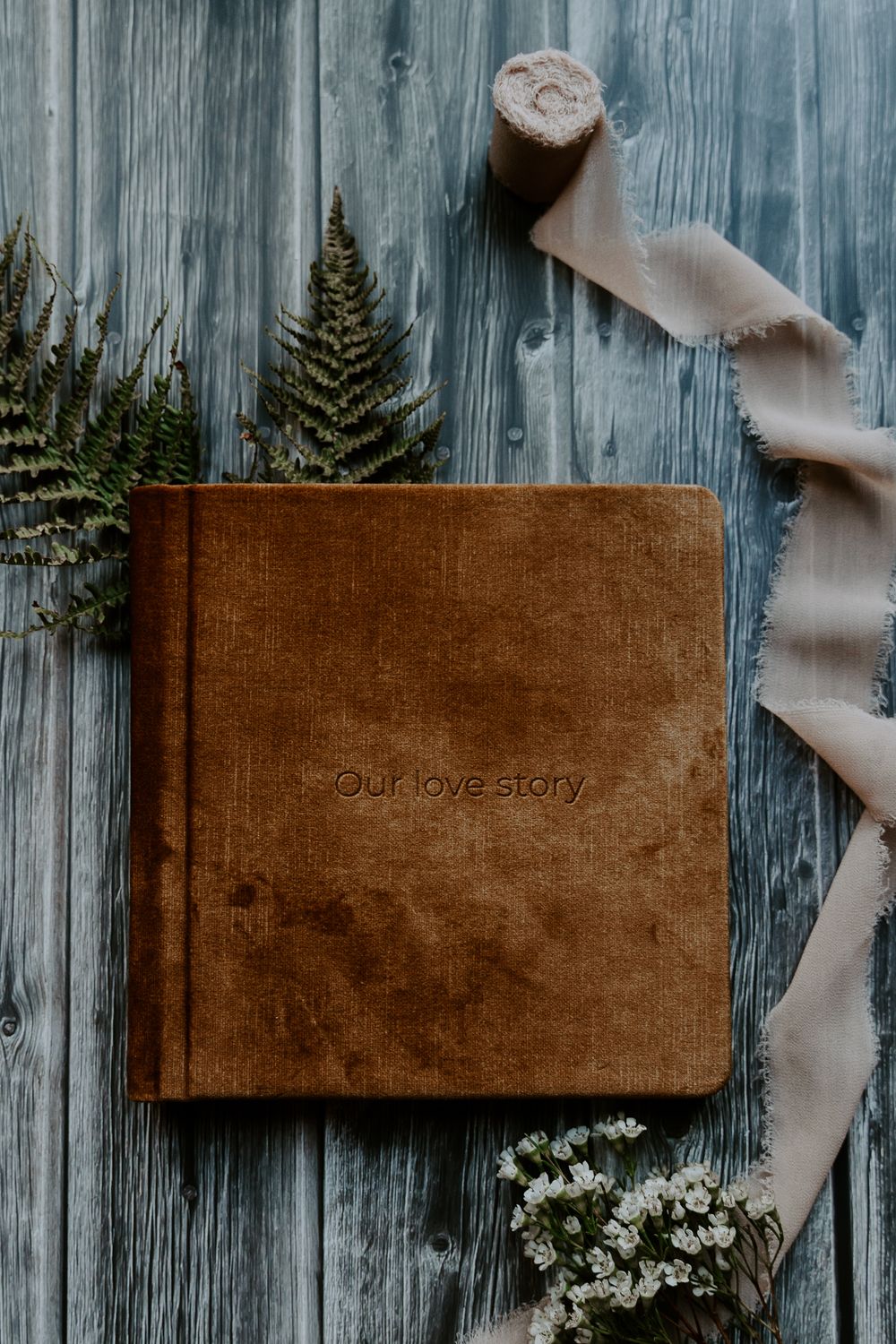 a close up image of a velvet covered album.