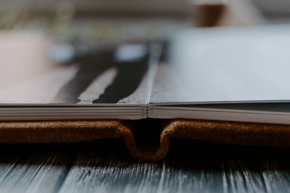 a close up image of a centre fold spread in an album.